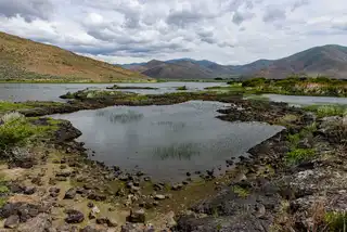 Formidable%20pool%20in%20black%20rock%20near%20Craters%20of%20The%20Moon%20National%20Monument