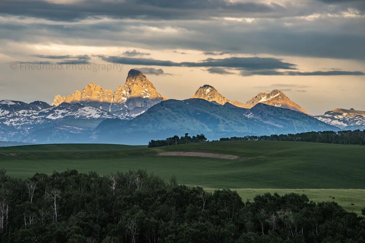 The%20Grand%20Teton%20catches%20the%20last%20of%20the%20dying%20light%20in%20a%20rare%20photo%20from%20the%20east%20side%20of%20the%20mountains.