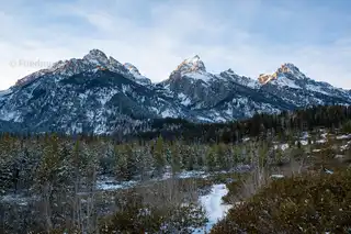 View%20of%20the%20tetons%20from%20the%20Taggart%20Lake%20trail%20in%20Grand%20Teton%20National%20Park.