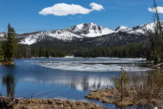 A%20partially%20frozen%2C%20high%20mountain%20lake%20near%20the%20east%20entrance%20to%20Yellowstone%20National%20Park