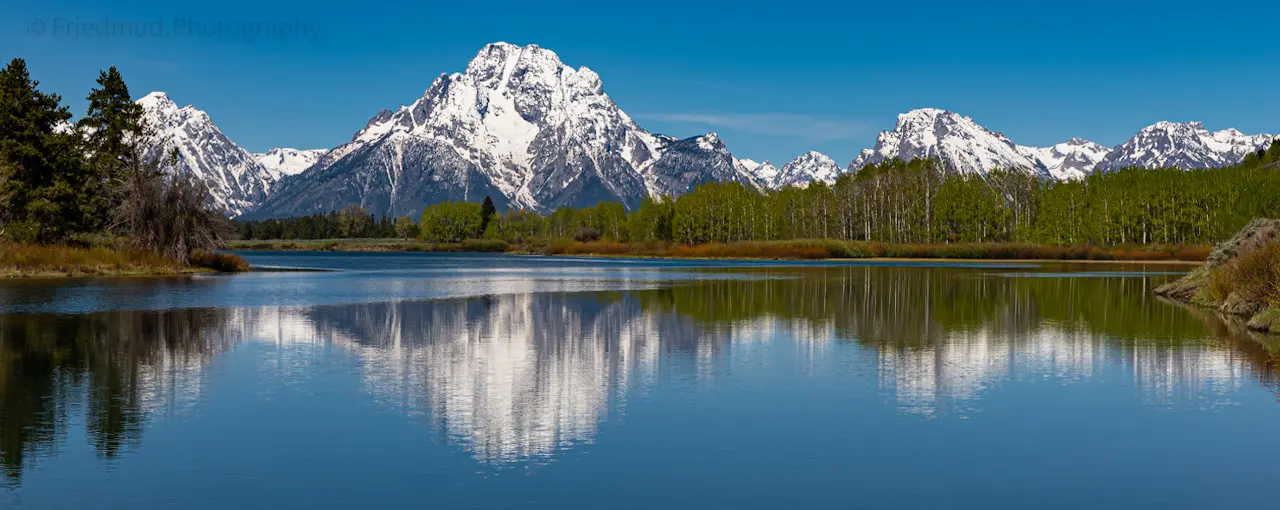 Symmetric%20reflection%20of%20Mt.%20Moran%20and%20company%20at%20Oxbow%20Bend%20in%20Teton%20National%20Park.