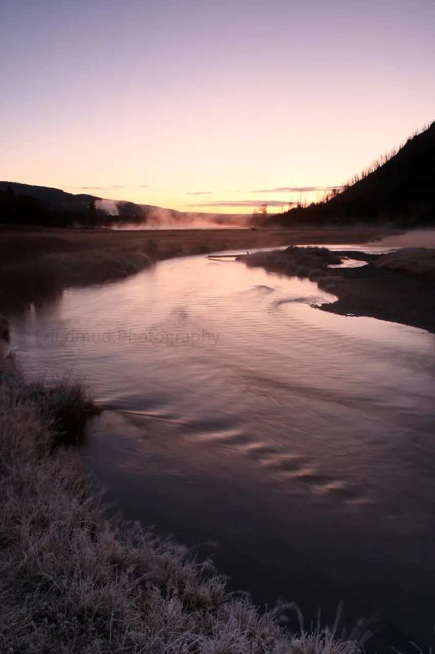 The%20sun%20rises%20over%20a%20misty%20Yellowstone%20on%20a%20cold%20morning.