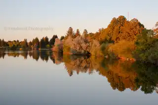 The%20setting%20sun%20reflected%20in%20the%20Snake%20River%20in%20Idaho%20Falls%2C%20ID.