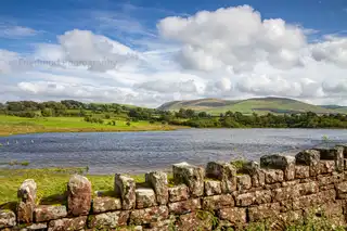 Driving%20through%20the%20Lakes%20District%20in%20Cumbria%20England%20%20on%20the%20A5086%20we%20spotted%20this%20lovely%20view.%20%20The%20wall%20appears%20to%20be%20ancient%20%28possibly%20part%20of%20an%20old%20Celtic%20castle%29%20but%20it%20was%20the%20rolling%20hills%20dotted%20with%20sheep%20that%20I%20really%20fell%20in%20love%20with.