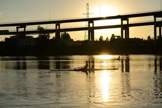 Two%20rowers%20work%20their%20way%20down%20the%20Willamette%20River%20in%20Portland%2C%20OR.